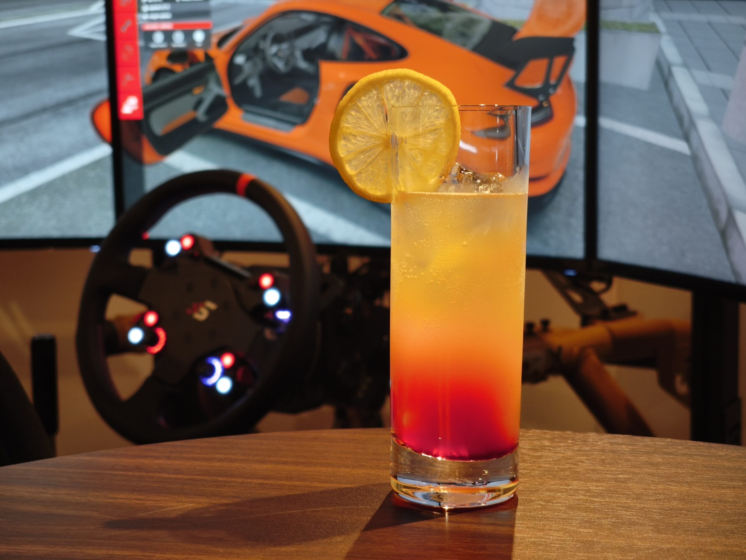 Mocktail in front of the racing simulator at mbPIT Shibuya