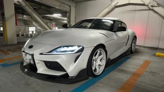 supra-a91-tuning-engine-drivetrain-1 – mbFAST Tuning 白いA91スープラの駐車場での外観写真